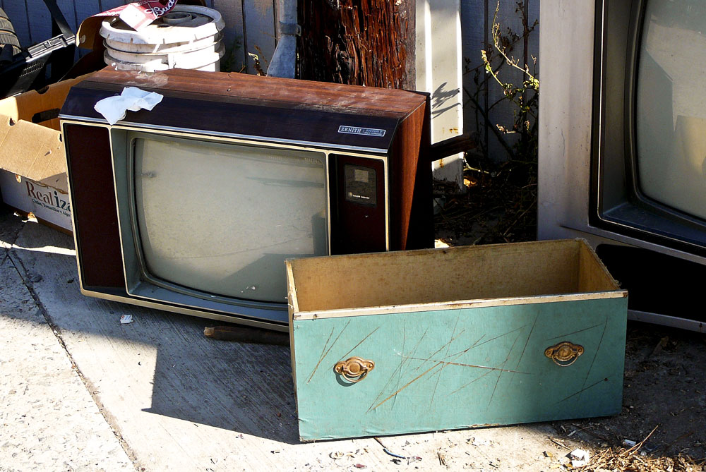 TVs and other items in alley behind 1700 block of Logan Avenue